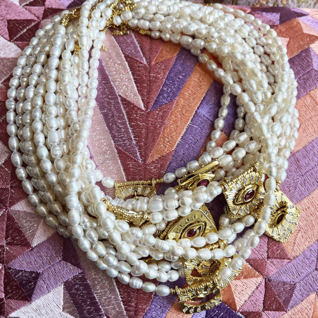 Ketting met zoetwaterparels en evil eye